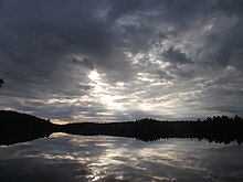 A view of the reserve from the Canoe Point campsite Haliburton Scout Reserve after sunrise from Canoe Point, July 2017.jpg