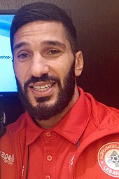 Hassan Maatouk is Lebanon's all-time record goalscorer and most-capped player. Hassan Maatouk with a fan 2019.jpg