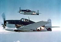 Dois F6F-3 sobrevoando o Pacífico, em maio de 1943.