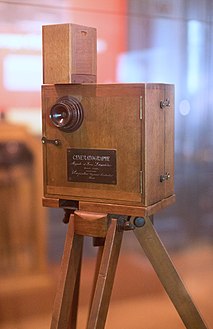 Cinematograph motion picture film camera which also serves as a projector and printer