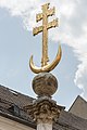 * Nomination Symbols of the world religions on top of the Holy Trinity column on Alter Platz, Klagenfurt, Carinthia, Austria --Johann Jaritz 02:55, 26 July 2016 (UTC) * Promotion Good quality. --Bgag 03:24, 26 July 2016 (UTC)*  Comment Believe me, Hans, you won´t find a islamic symbol on a christian monument like this! This is a archbishop cross plus a laying halve moon, with different meanings (– Offb 12,1 EU) or the wholeness of all believers. --Hubertl 05:15, 26 July 2016 (UTC)  Comment Let me cite DEHIO Kärnten, page 399: "Auf schlanker korinthischer Säule Kugel, Halbmond und Doppelbalkenkreuz (Symbol der Weltreligionen)" --Johann Jaritz 05:27, 26 July 2016 (UTC)