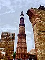 Kutub Minar in braces.jpg