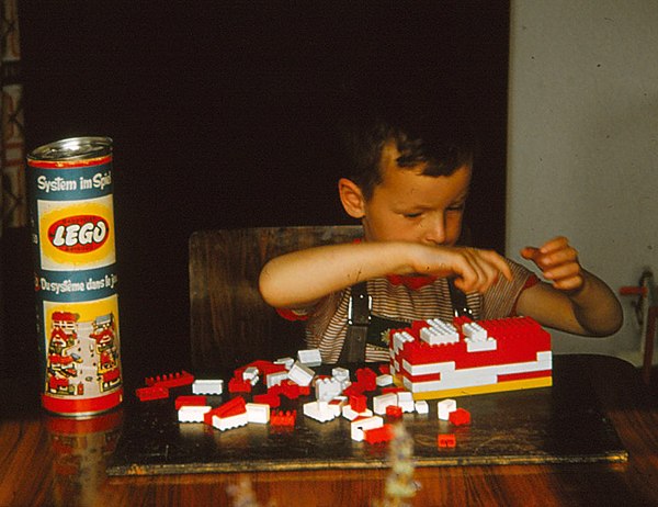 Boy from the UK playing with Lego in 1957. First sold in Denmark, the company expanded its sales across Europe in the 1950s, before expanding outside 