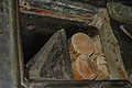 Logs in the grinder at the historical Verla groundwood and board mill (Finland).