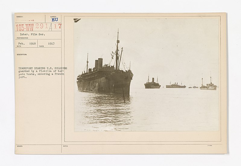 File:Military Operations - Convoys - Enroute - Transport bearing U.S. soldiers guarded by a flotilla of torpedo boats, entering a French port - NARA - 45503687.jpg