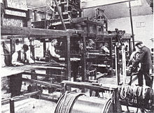 The weaving shed in Morris & Co's factory at Merton, which opened in the 1880s Morris and Company Weaving at Merton Abbey.jpg