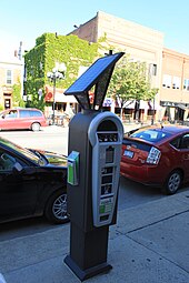 A solar-powered multi-space meter in Ann Arbor, Michigan. Similar meters are also used in White Rock, British Columbia, and Houston, Texas. Solar is optional. Multi-space parking meter.JPG
