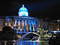 Image 5 National Gallery Photo credit: Michael Reeve The National Gallery at night, illuminated for an event to promote the launch of a Pepsi commercial. The National Gallery in London is an art gallery designed by William Wilkins. It holds part of the National Collection, particularly Western European art from 1250 to 1900. The collection of 2300 paintings belongs to the British public. More featured pictures