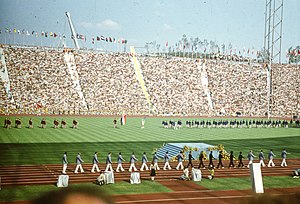 the Algerian team (at the background track) entering in the opening ceremony Olimpiai Stadion, az olimpia megnyitounnepsege. Fortepan 73755.jpg