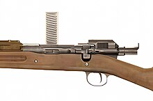 The Pedersen device allowed bolt action M1903 Mark I rifles with a left side ejection port to fire .30 caliber pistol-grade cartridges in a semi-automatic fire mode. Pedersondevice.jpg