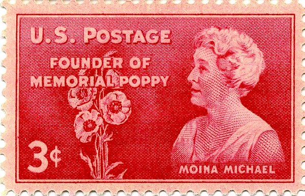 Moina Michael on a U.S. postage stamp. Michael first proposed using poppies as a symbol of remembrance.