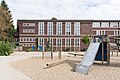 Deutsch: Hofseite des Aulaflügels der Schule Beim Pachthof in Hamburg-Horn.