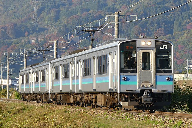 Matsumoto-based E127-100 series set A1 on the Shinonoi Line in November 2017