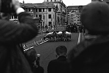 A small number of sheep are herded across Southwark Bridge by the Lord Mayor and Yorkshire Shepherdess among others, London 2021. Sheep Cross Southwark Bridge in London 2021.jpg
