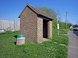 Brick bus shelter at Lunsford's Cross.