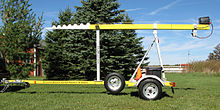 Trailer-mounted telescoping mast in the travel position Side-view-close-up-web.jpg