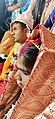 Sindur daan Hindu ritual as the groom is full blind ladies assisting her to complete rituals at Voice Of World Kolkata 49