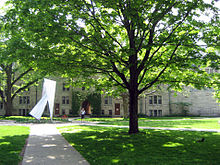 At the centre of the main college quadrangle is a sculptural representation of Saint Michael. Stmichaels quad toronto.jpg