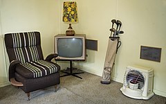 BW TV set, Golf clubs and other vintage furniture in a beach house from the ('50s house or 50's house) Auckland, New Zealand