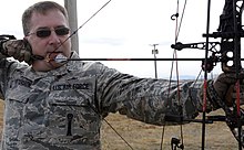 Chief Master Sgt. Kevin Peterson demonstrates safe archery techniques while aiming an arrow at a target on the 28th Force Support Squadron trap and skeet range at Ellsworth Air Force Base, S.D., 11 October 2012. Thrill of the hunt.jpg