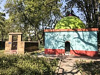 Mir Madan's tomb (left) and Farid Shah's darga (right) Tomb of Mirmadan 15.jpg