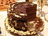 Tort - multi-layered sponge cake filled with buttercream or whippedcream, with fruits or nuts, served on special occasions like nameday or birthday