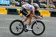 Warren Barguil in the polka dot jersey at the 2017 Tour de France Tour de France 2017, Stage 21 (36097636686) (cropped).jpg