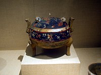 A painted earthenware tripod, Western Han dynasty, late 3rd century BC to early 1st century AD