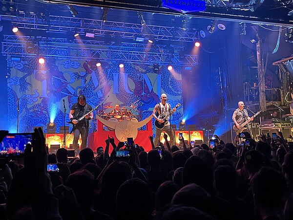 Trivium performing in Barcelona in 2023. From left to right: Corey Beaulieu, Alex Bent, Matt Heafy and Paolo Gregoletto