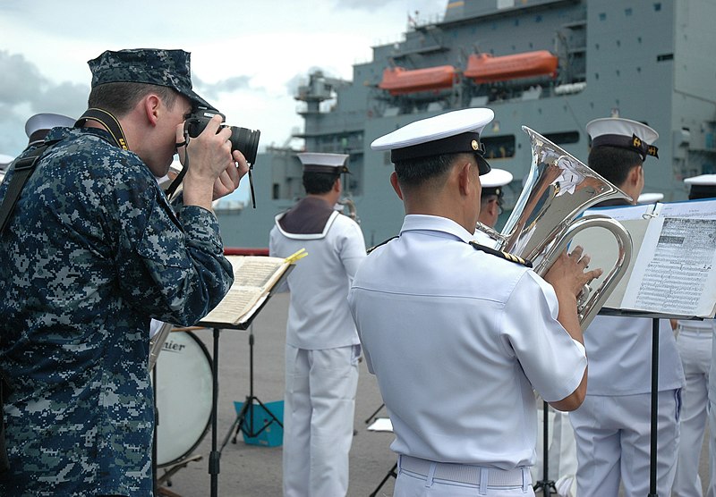 File:U.S. Navy Mass Communication Specialist 1st Class Patrick Dille takes a photo of the Royal Thai Navy band during the arrival of the dry cargo ship USNS Washington Chambers (T-AKE 11) in support of Cooperation 130603-N-RG360-126.jpg