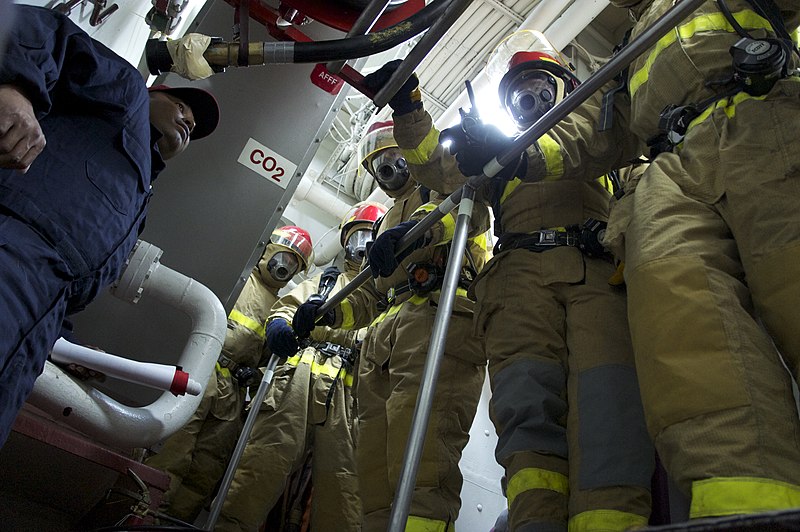 File:US Navy 110623-N-ZC343-013 Sailors aboard USS Bonhomme Richard (LHD 6) prepare to relieve the primary hose team during a main space fire drill.jpg