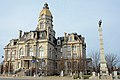 Vigo County Courthouse? Rooster or peacock? --doncram Added to article, with photo of a different pediment including a person. --~~~~