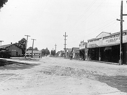 Northwestern Pacific Railroad depot and surrounding street in Windsor, 1900