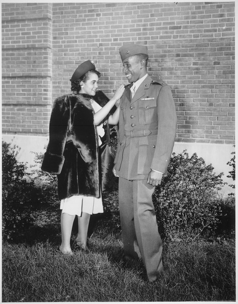 File:"The first Negro to be commissioned in the Marine Corps has his second lieutenant's bars pinned on by his wife. He is Fr - NARA - 532577.tif