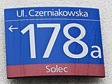 Tabliczka adresowa na apartamentowcu przy ulicy Czerniakowskiej 178a w Warszawie