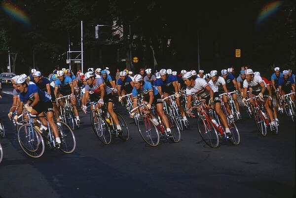 The peloton of the race making a turn on the course