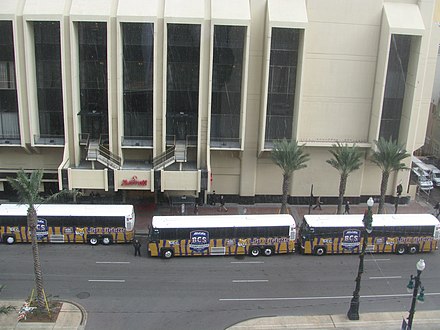 LSU Tigers football team bus at New Orleans Marriott viewed from Sheraton New Orleans