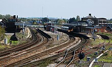 Seen from the Forty steps footbridge, which crosses the line (and many former sidings) at the west end. Platform 5 is on the left, while a CrossCountry train to Plymouth is at platform 2.