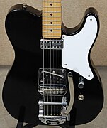 Closeup of Squier. Note traditional Telecaster single coil pickup and stock Bigsby vibrato.