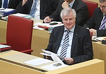 Seehofer, seated in the Landtag of Bavaria in 2013 2013-04-11 Horst Seehofer (Landtag) 102.JPG