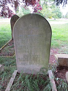 The gravestone of two young adults who died in the epidemic. A headstone for two victims.jpg
