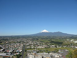 Looking across New Plymouth with کوه تاراناکی in the distance in mid-July 2010