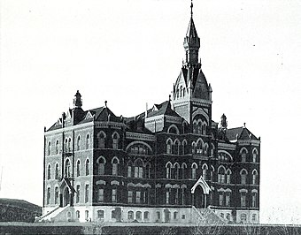 The original Administration building (1899) was destroyed by fire in 1906. It was replaced in 1909 by the existing brick Collegiate Gothic structure.