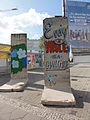 Berlin Wall graffitti instalation at Checkpoint Charlie, Berlin