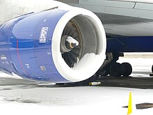 Snow building on the intake to a Rolls-Royce RB211 engine of a Boeing 747-400. Snow and ice present unique threats, and aircraft operating in these weather conditions often require de-icing equipment. Boeing 747-400 (British Airways) (5282775118).jpg