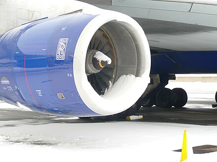 Snow building on the intake to a Rolls-Royce RB211 engine of a Boeing 747-400. Snow and ice present unique threats, and aircraft operating in these weather conditions often require de-icing equipment.