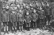 Youth survivors of the Buchenwald concentration camp during the Holocaust. The youth that survived this camp were primarily young Jewish males. Buchenwald Children 19753.jpg