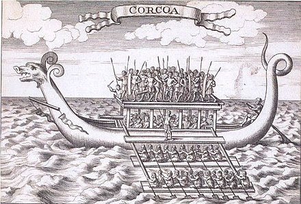 18th-century engraving of a karakoa from The Discovery and Conquest of the Molucco and Philippine Islands (1711) by Bartolomé Leonardo de Argensola, showing burulan amidships, a pair of pagguray, and two pairs of daramba on each side[1]