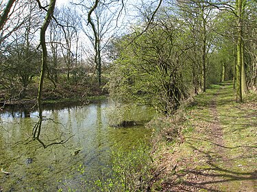 The now derelict Charnwood Forest Canal alongside the entrance to Longcliffe Golf Club in Nanpantan. CharnwoodForestCanal 01.jpg