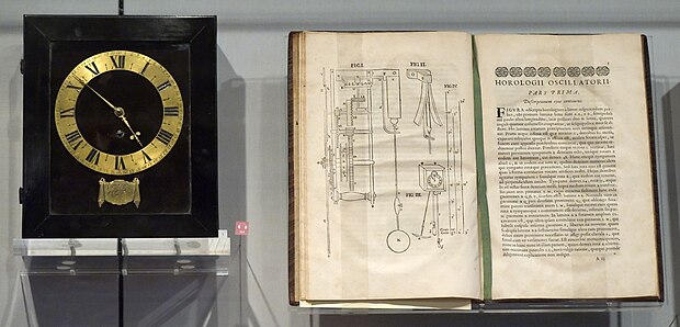Spring-driven pendulum clock, designed by Huygens and built by Salomon Coster (1657),[110] with a copy of the Horologium Oscillatorium (1673),[111] at Museum Boerhaave, Leiden.